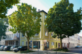 Gebäudeansicht - Voll vermietetes Wohn- & Geschäftshaus mit genehmigter Aufstockung