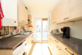 1.OG: 3-Zimmer-Wohnung - Voll vermietetes Wohn- & Geschäftshaus mit genehmigter Aufstockung